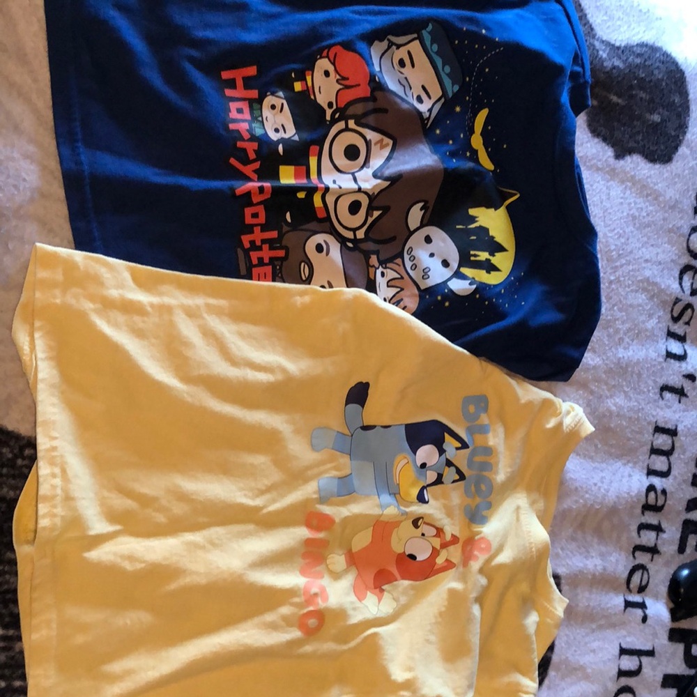 Vibrant Blue and Yellow Cartoon Graphic Tees
